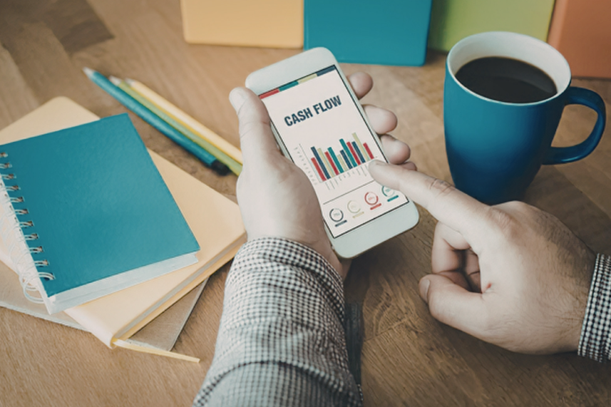 person using financial tracking systems to check cash flow dashboard on smartphone