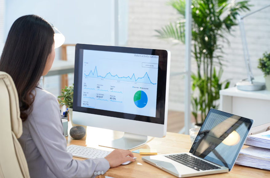 Person reviewing website analytics for digital assets as investments